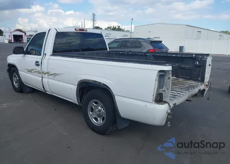 2001 Chevrolet Silverado 1500 из США, поврежденный, VIN 1GCEC14W71Z217897